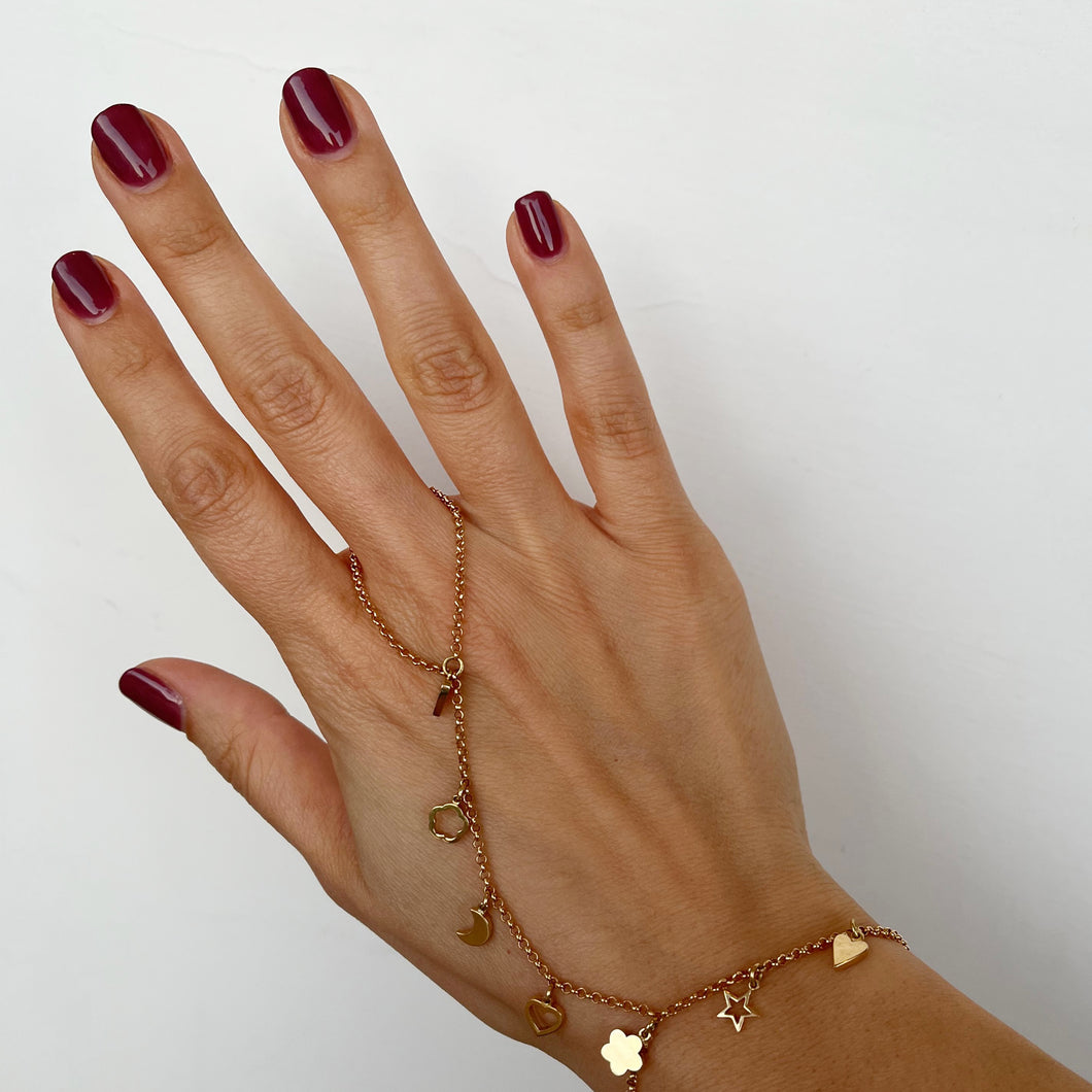 Bracciale baciamano in Oro Giallo con 7 ciondoli